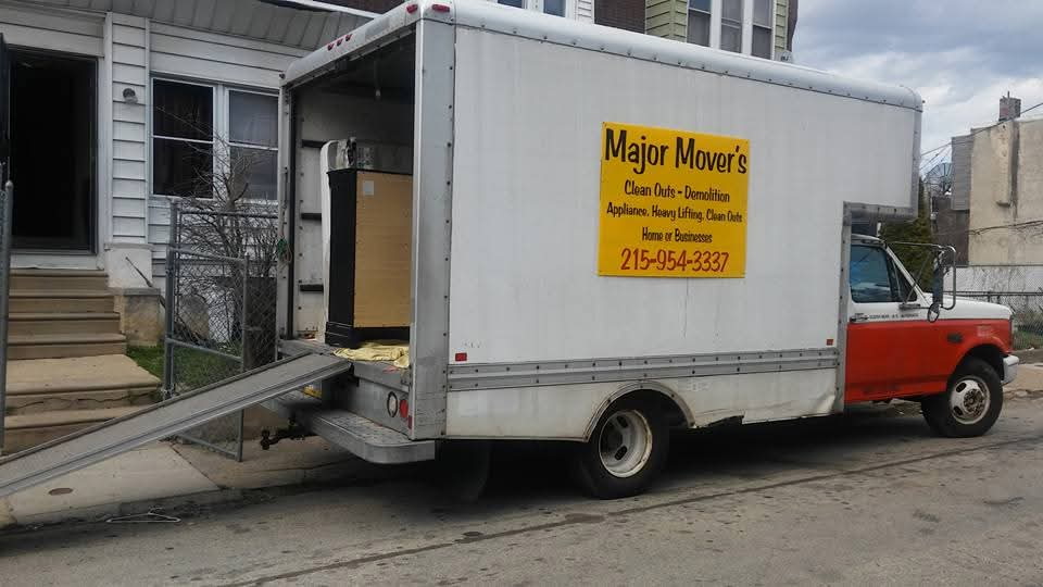Major Movers box truck with ramp down on a Philadelphia street